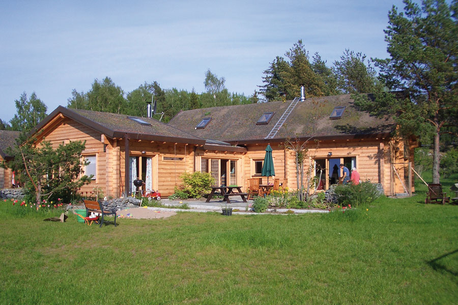 Holzhaus aus massiven Kantbalken "Werr" (Bayern Block GmbH, Schweden)