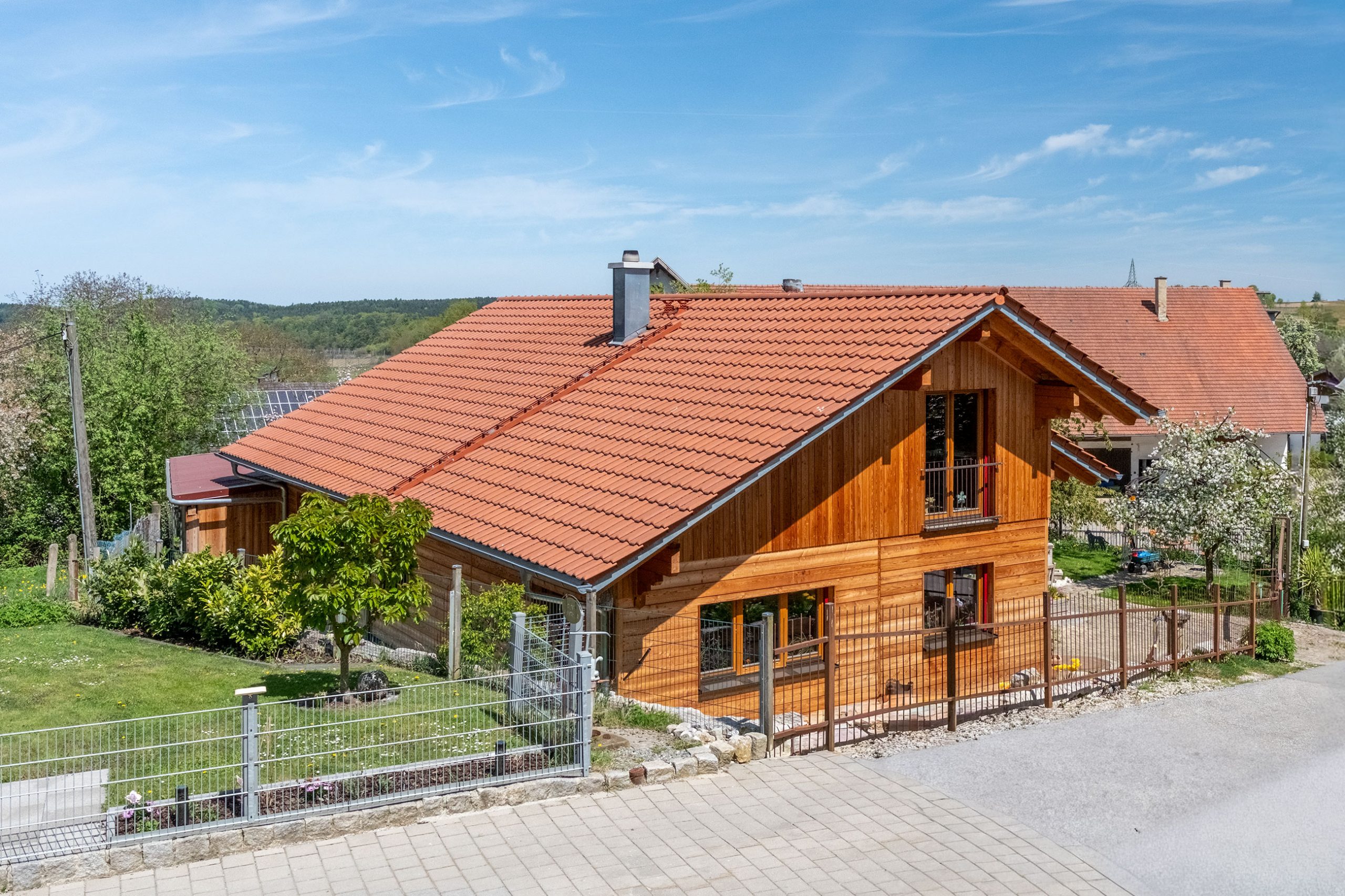 BV Wiesenberger – Einfamilienhaus Holzhaus mit überdachter Terrasse BV Wiesenberger – Einfamilienhaus Holzhaus mit überdachter Terrasse