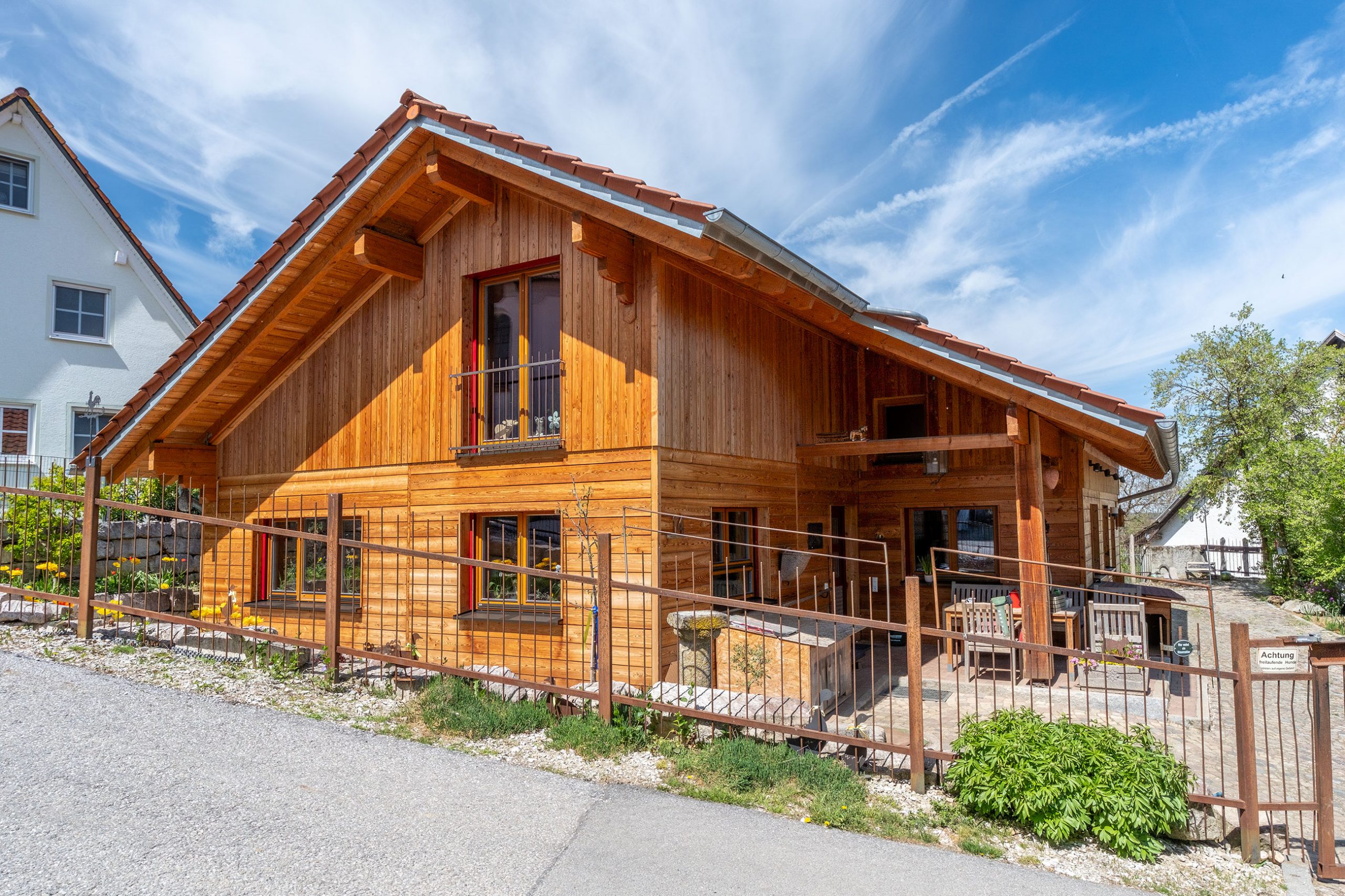 BV Wiesenberger – Einfamilienhaus Holzhaus mit überdachter Terrasse
